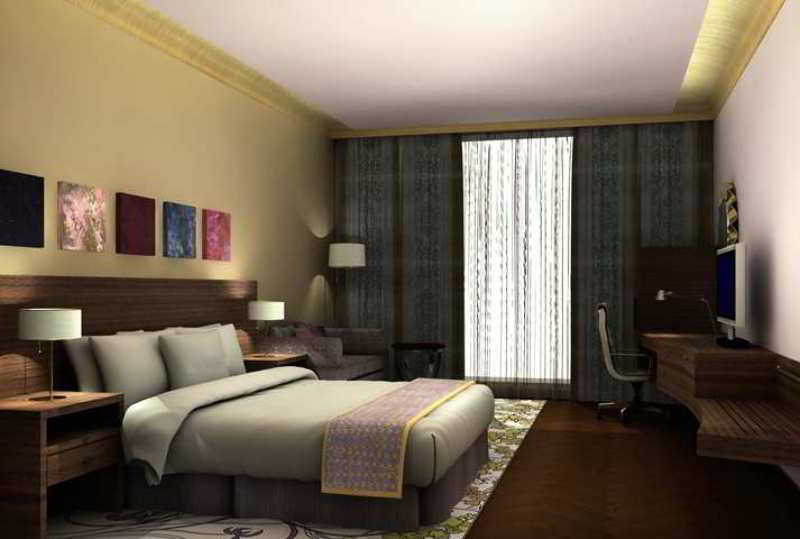 Hilton Jaipur Hotel Luaran gambar A typical hotel room